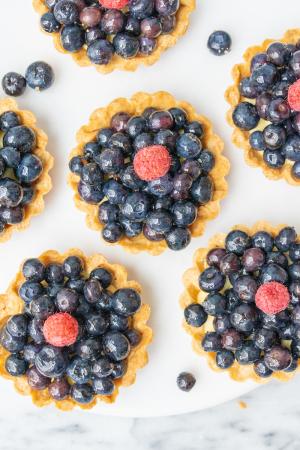 Blueberry tarts on a marble surface